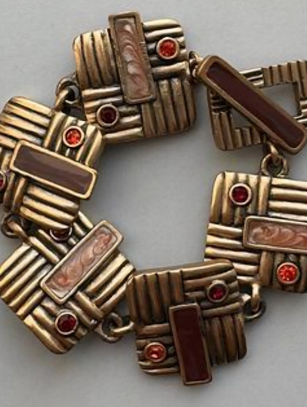 Vintage-Inspired Gold Tone Bracelet with Maroon Accents